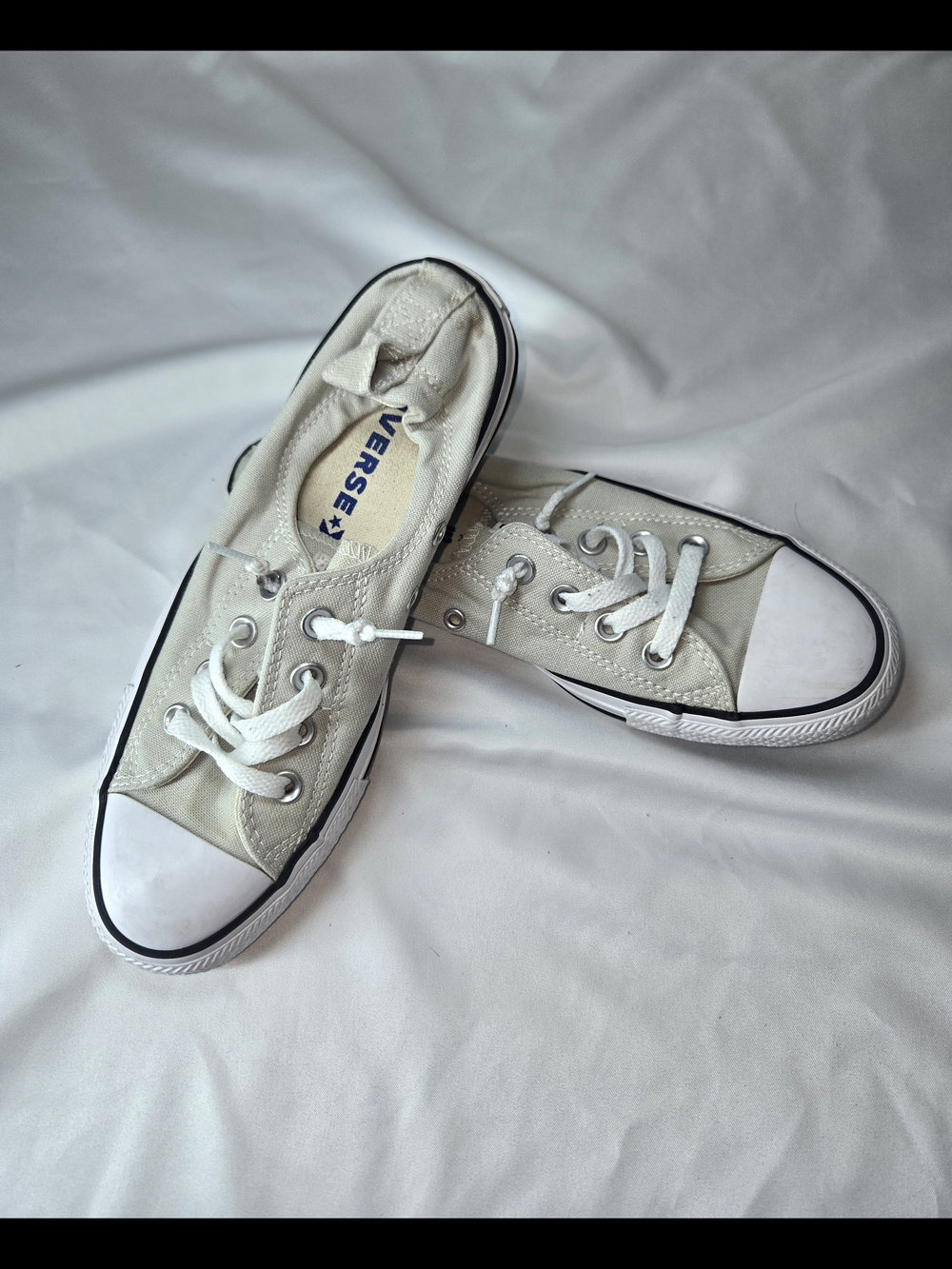 Converse Low Top Sneakers in Off-White with Black Trim